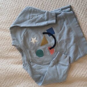 Hanna Andersson Blue Toddler Sweatshirt with Stars and Shapes.